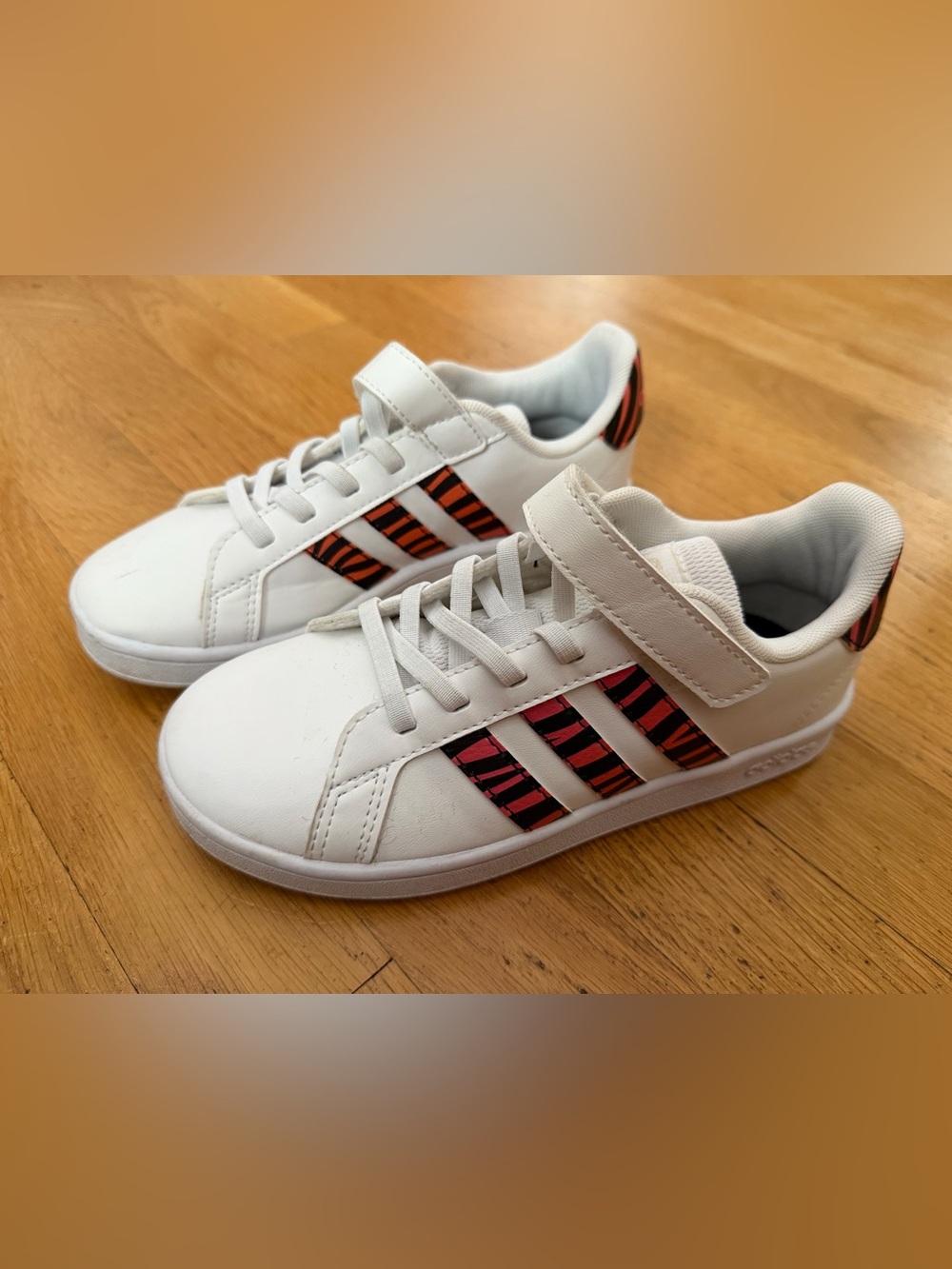 Adidas Kids White Sneakers with orange Accent Stripes Size 1.5 US